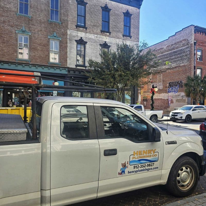 Henry Plumbing's utility truck parked in downtown Savannah GA.