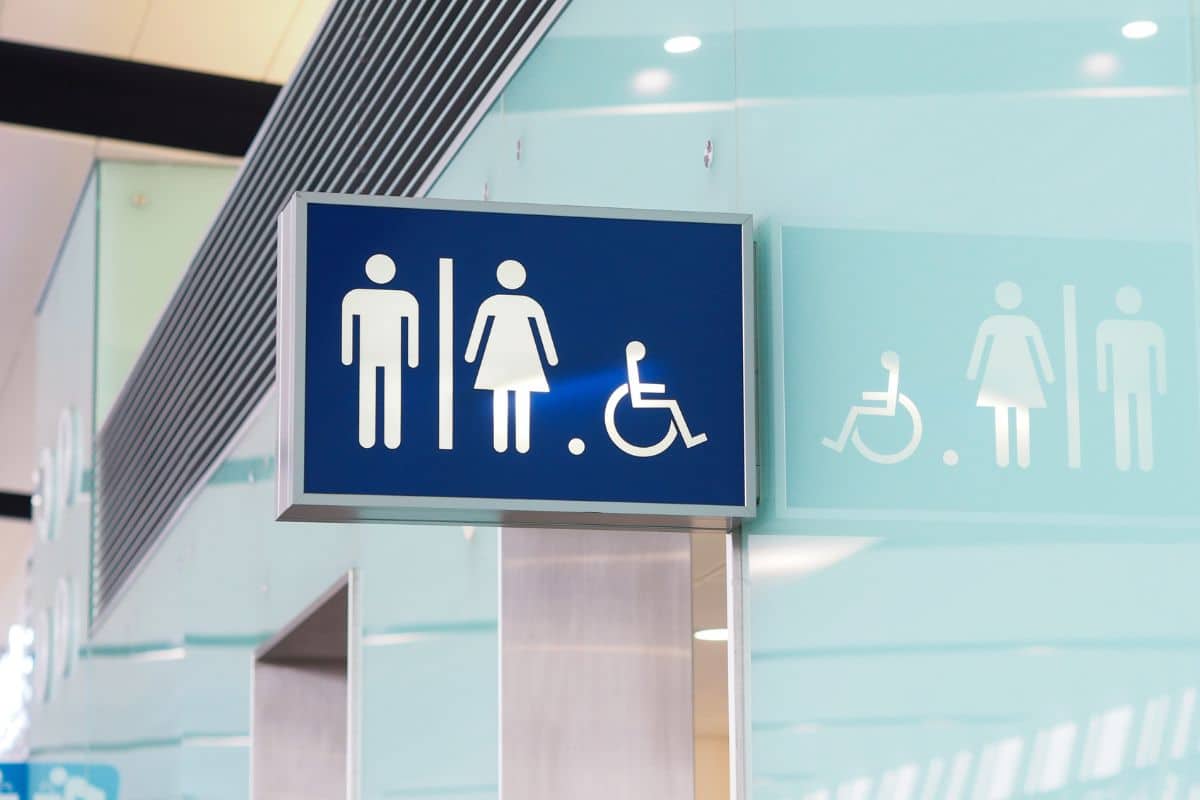 ADA accessible restroom sign in commercial building