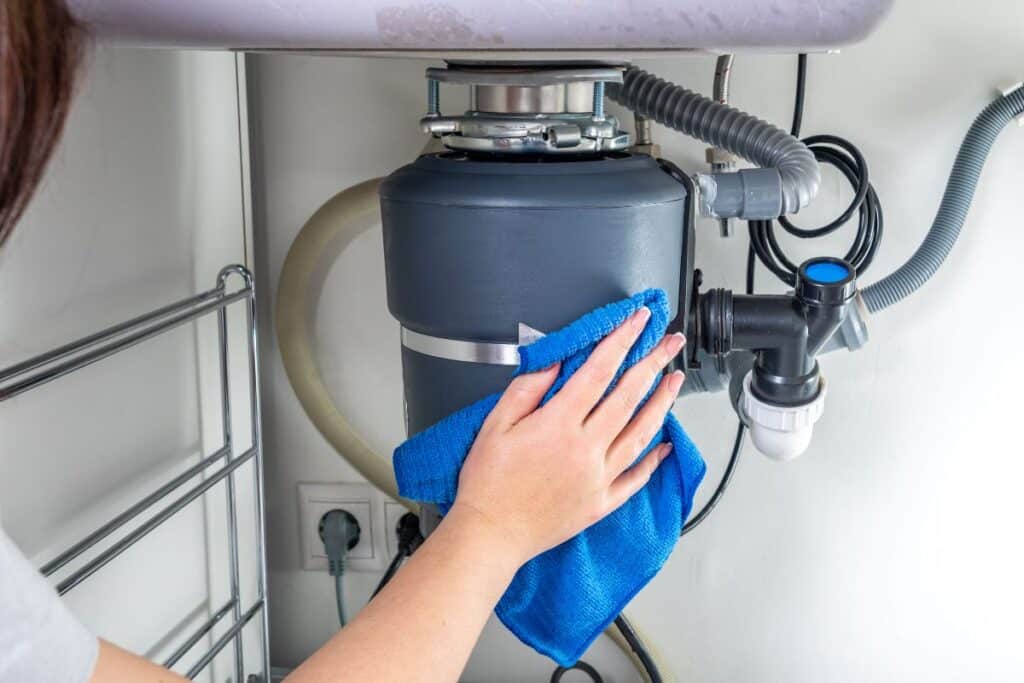 Garbage disposal repair and installation service by Henry Plumbing