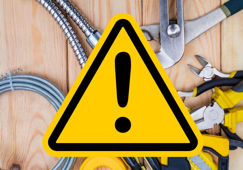 Plumbing warning sign for potential plumbing repairs and water damage