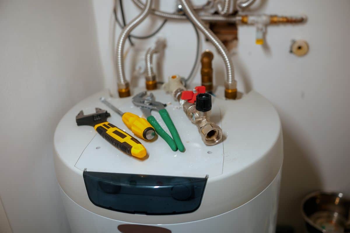 Residential water heater plumbing components and repair tools
